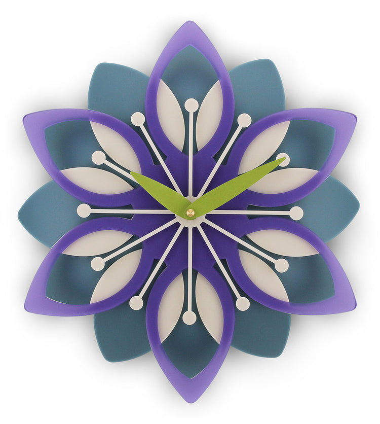 Decorative wall clock with a floral design in purple, blue, and green on a white background