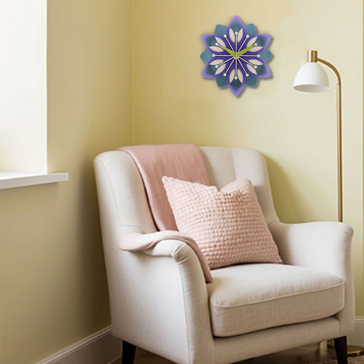 Decorative wall clock with floral design.