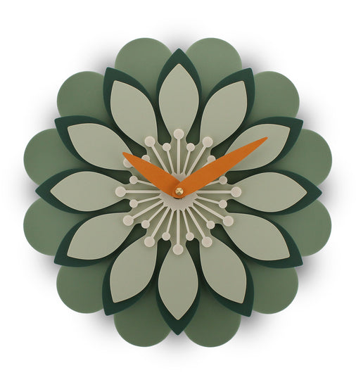 Decorative wall clock with a floral design on a white background