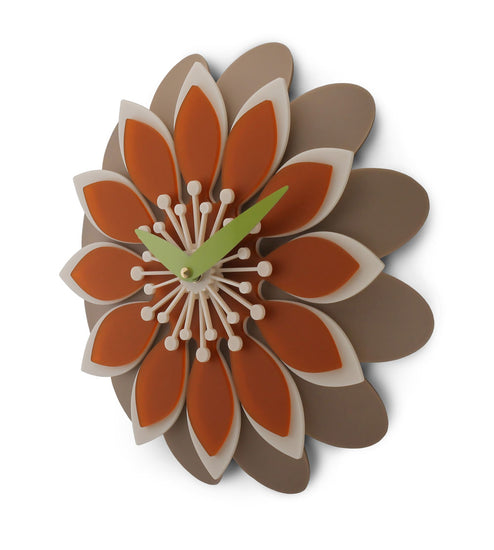 Floral retro formed wall clock with orange and brown petals on a white background