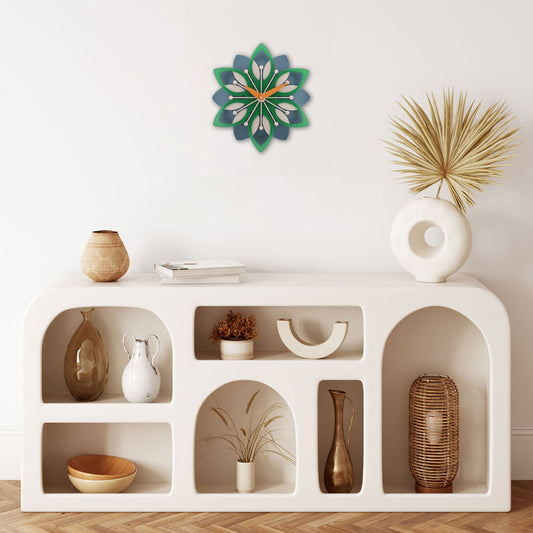 Decorative wall clock with floral design.