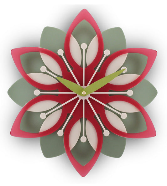 Decorative wall clock with a floral design in red, green, and white on a white background