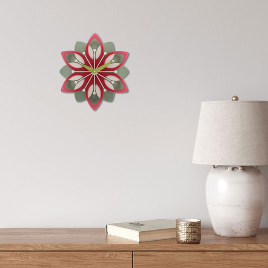 Decorative wall clock with floral design.